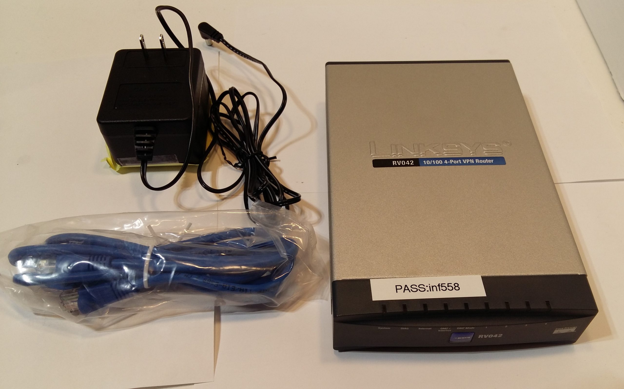 Routeur VPN Cisco Linksys RV042 10/100 à 4 ports double WAN avec alimentation